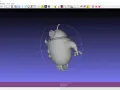 Szary model robota 3D na fioletowym tle, widoczny w oprogramowaniu MeshLab.